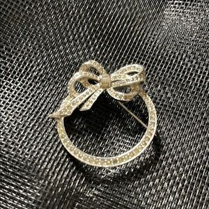 Elegant Silver Bow Brooch